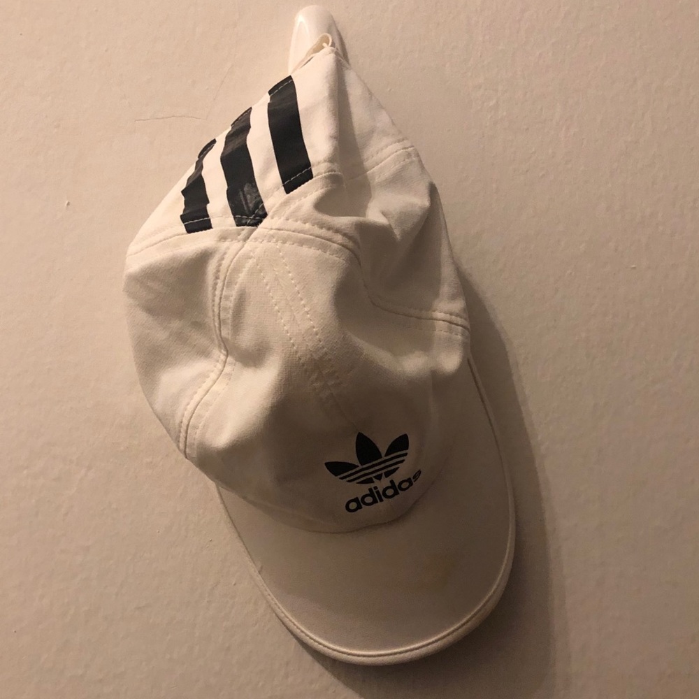 Adidas white trefoil hat with minor makeup stain